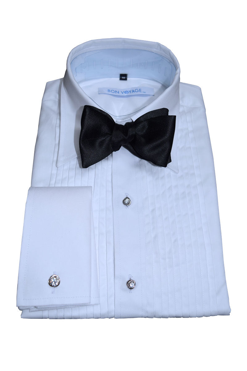 close-up white tuxedo shirt with laydown collar and black bowtie with cubic zirconia studs and cufflinks in a silver setting
