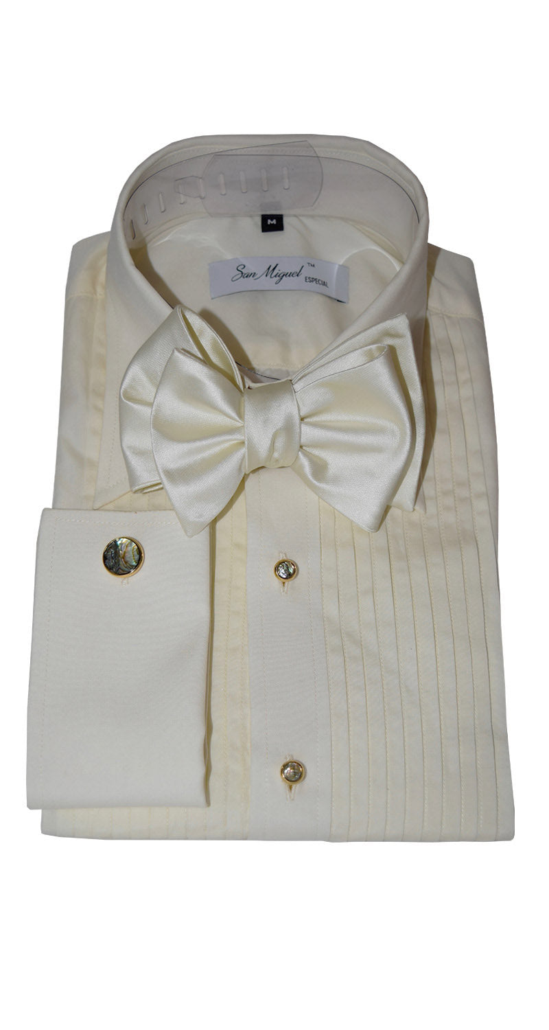 an ivory tuxedo shirt with ivory bowtie displaying abalone studs and cufflinks with gold setting