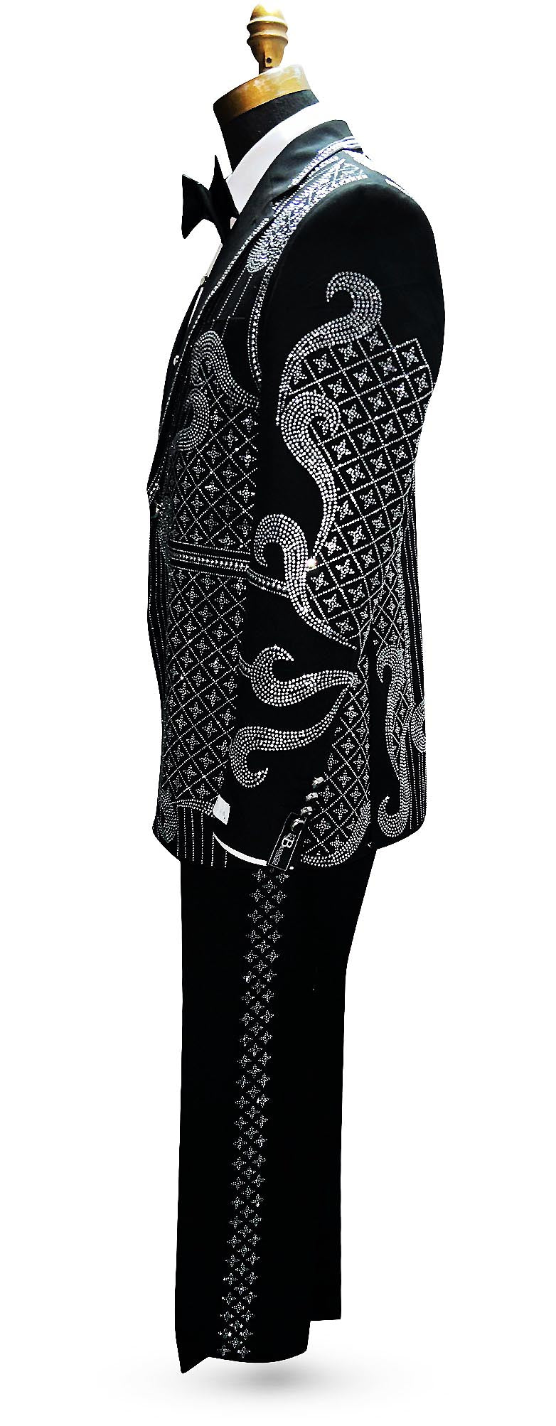 side view left side mannequin wearing a black suit jacket and matching pants with beautiful rhinestones pattern and white shirt with black satin bowtie