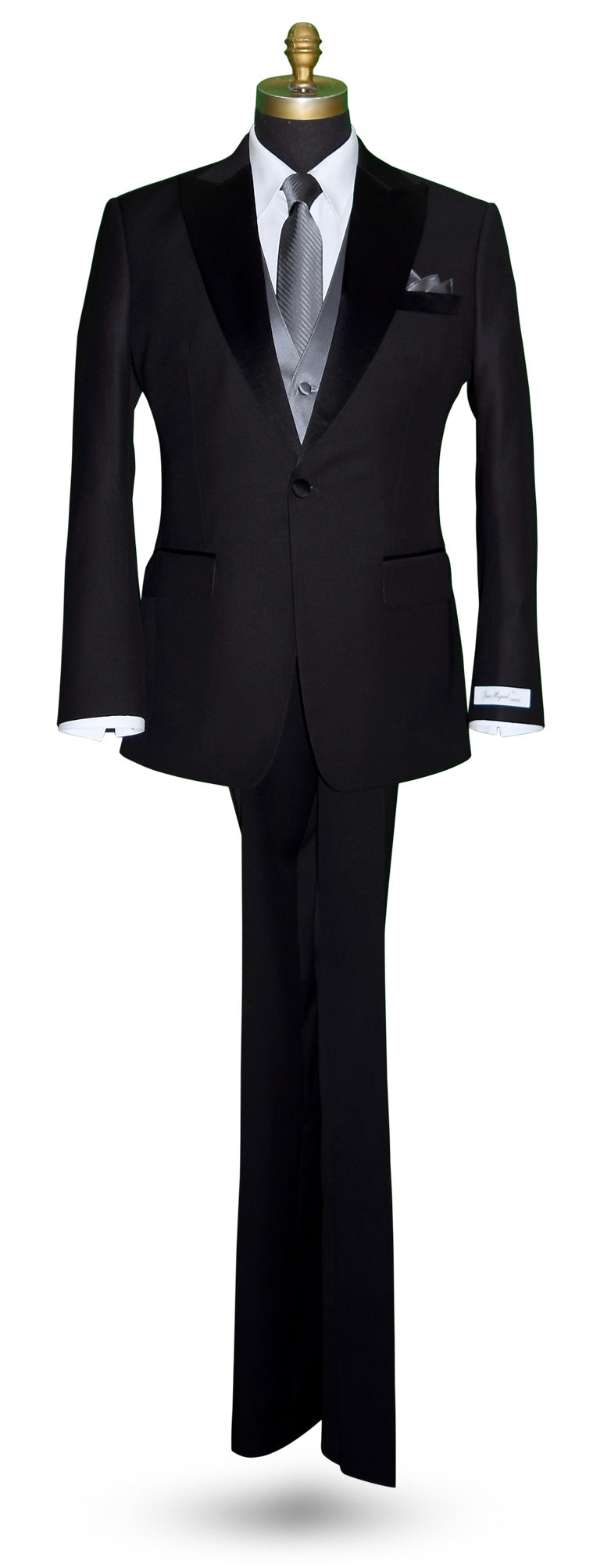 life size mannequin wearing a black peak lapel tuxedo with a white shirt and charcoal satin vest and charcoal subtle stripe necktie against a white background