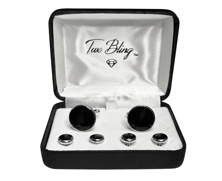 Set of black cufflinks and buttons in a 'Tux Bling' box on a white background