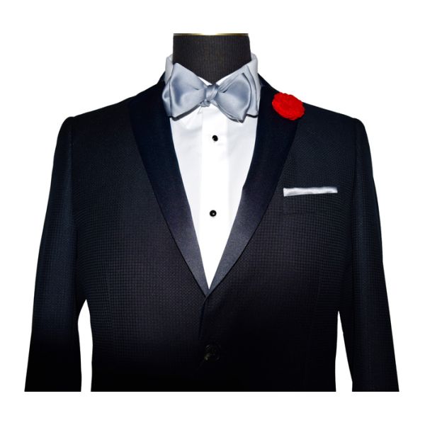 close-up midnight blue tuxedo jacket on a mannequin with a silver-gray tie-yourself bowtie and light gray tuxedo pants against a white background