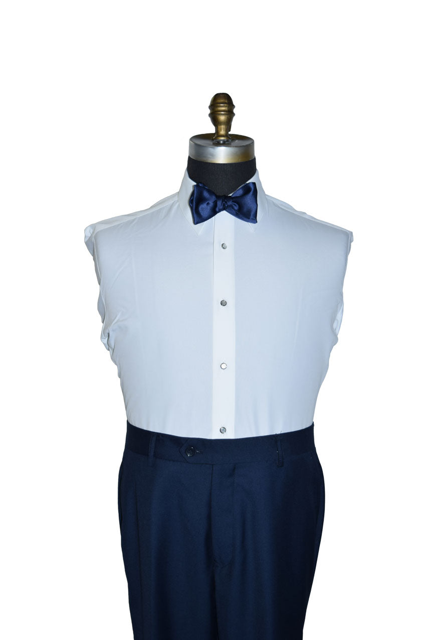 White dress shirt with navy blue satin "tie-yourself" bow tie and navy pants on a mannequin against a white background