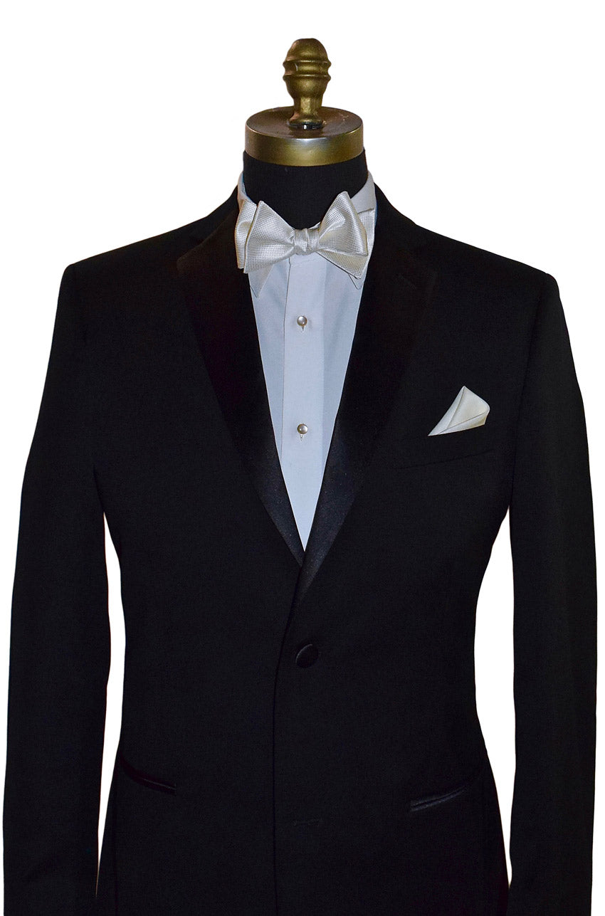 full mannequin wearing a black tuxedo with a white tuxedo shirt and an off-white piques tie-yourself bowtie