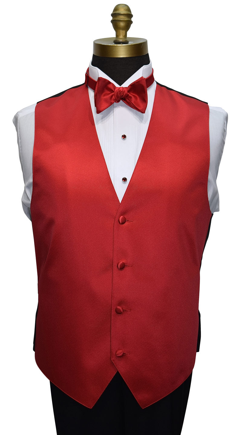 Red vest and bow tie set on a mannequin with a white shirt shown with red studs and cufflinks against a white background