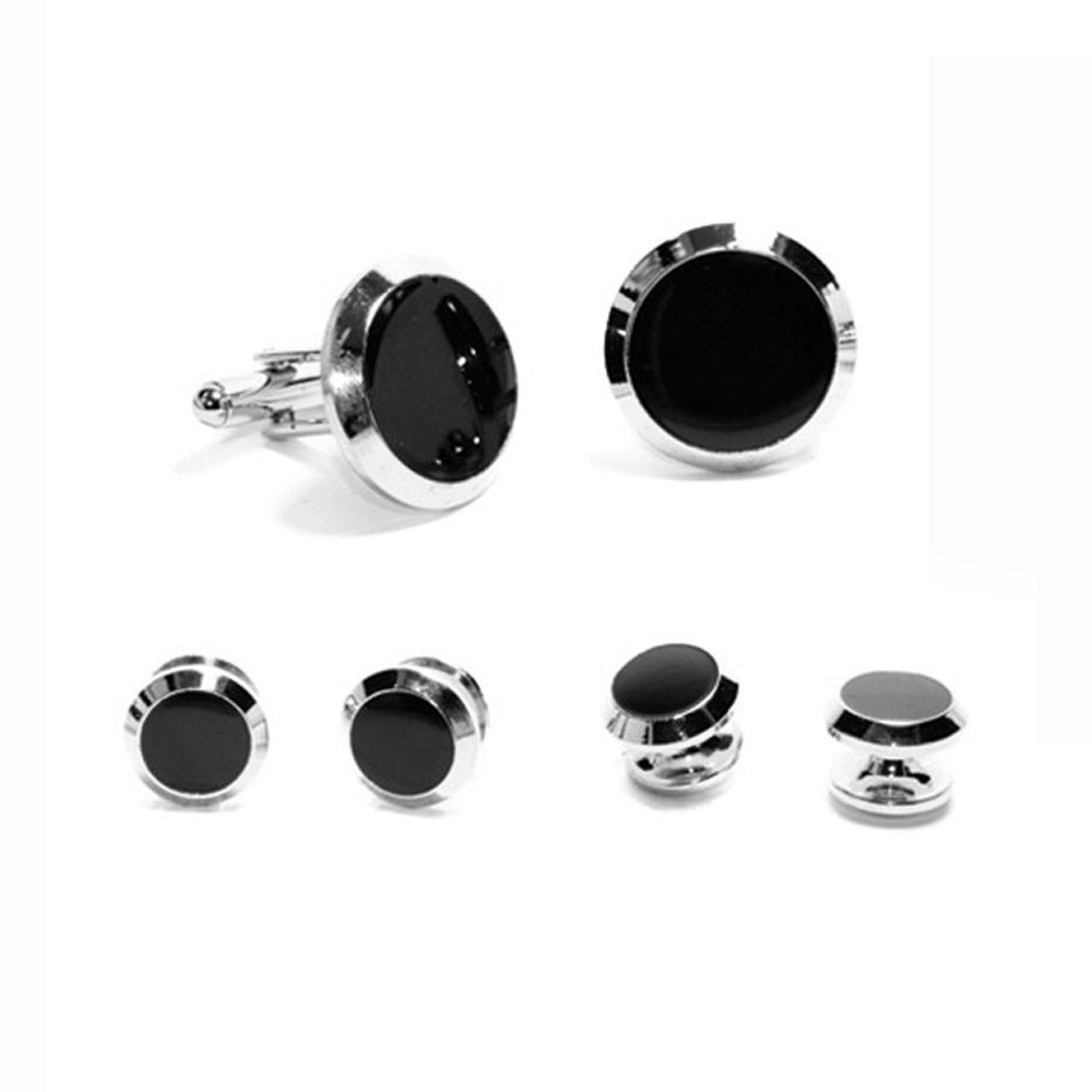 Black and silver cufflinks set on a white background