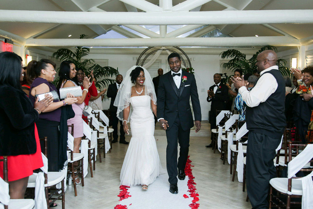 2-Button Black Notch Lapel Tuxedo with Black Satin Bow Tie