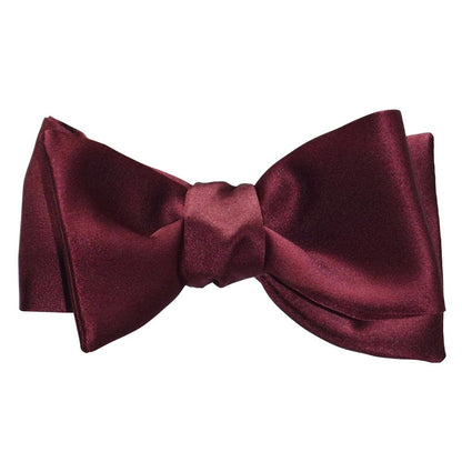 Burgundy "tie-yourself" bow tie on a white background