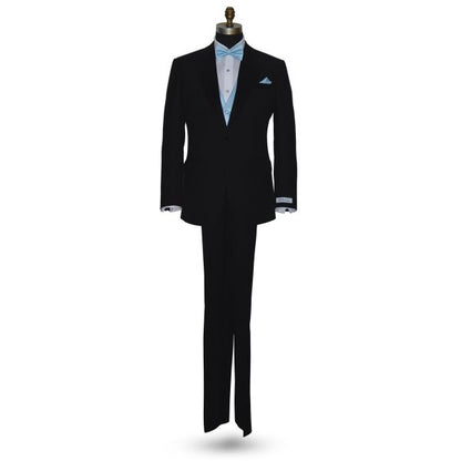 full mannequin front view Black tuxedo with "San Miguel Especial" branded label wearing a capri-blue bow tie and pocket square against a white background