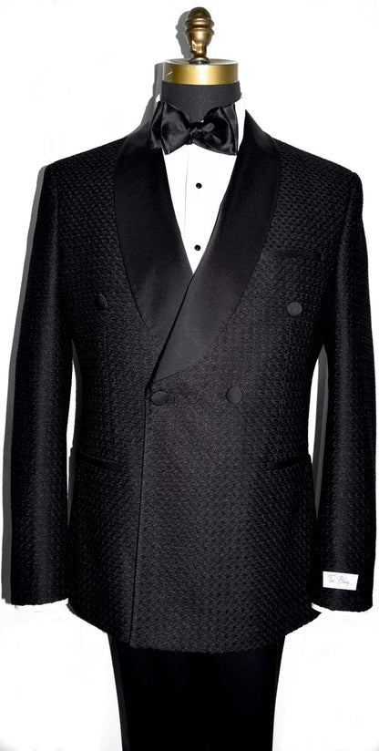 close-up front view black double-breasted shawl collar tuxedo with a black bow tie against a white background 