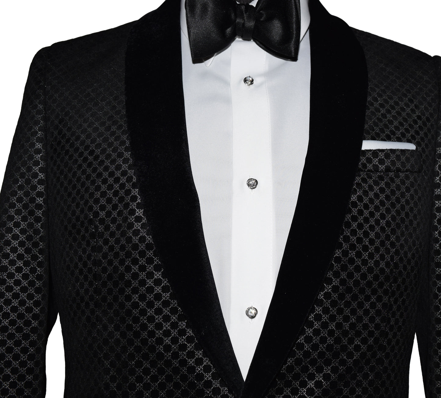 Black velvet shawl collar tuxedo with white shirt and bow tie and crystal studs and cufflinks on a white background