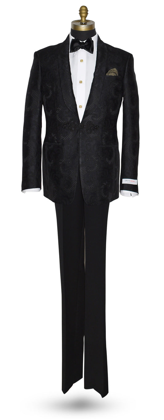 mannequin wearing Black shawl collar tuxedo with brocade pattern shown with white tuxedo shirt and black bow tie on a white background