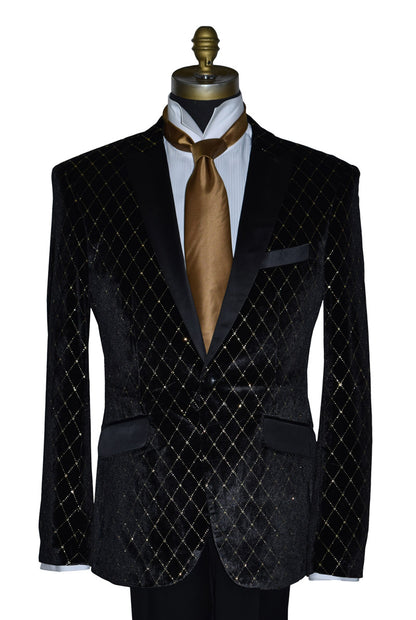 black velvet tuxedo with gold diamonds pattern on a mannequin with a long gold necktie and a white tuxedo shirt