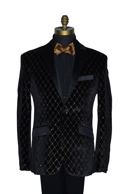 close-up Black velvet jacket with gold diamonds shown with black pants with a gold bow tie on a mannequin against a white background