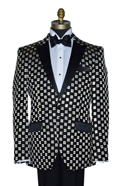 close-up life size mannequin wearing a black and gold tuxedo with a black bowtie against a white background