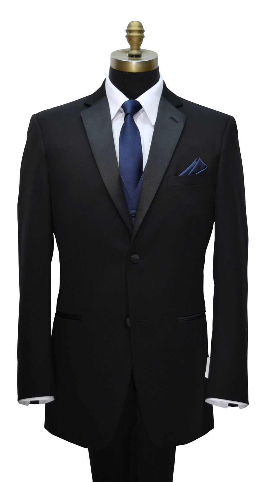 Black notch lapel tuxedo with a marine-blue necktie and a marine-blue tuxedo vest and pocket square on a mannequin against a white background