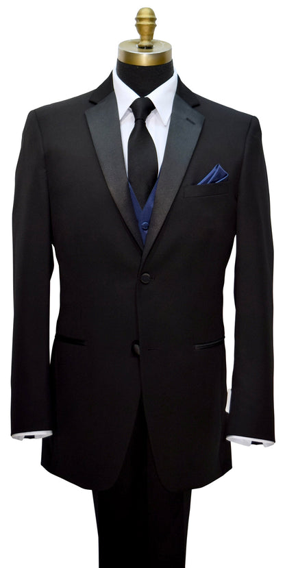Black notch-lapel tuxedo with a a black satin long necktie and a marine-blue vest on a mannequin against a white background