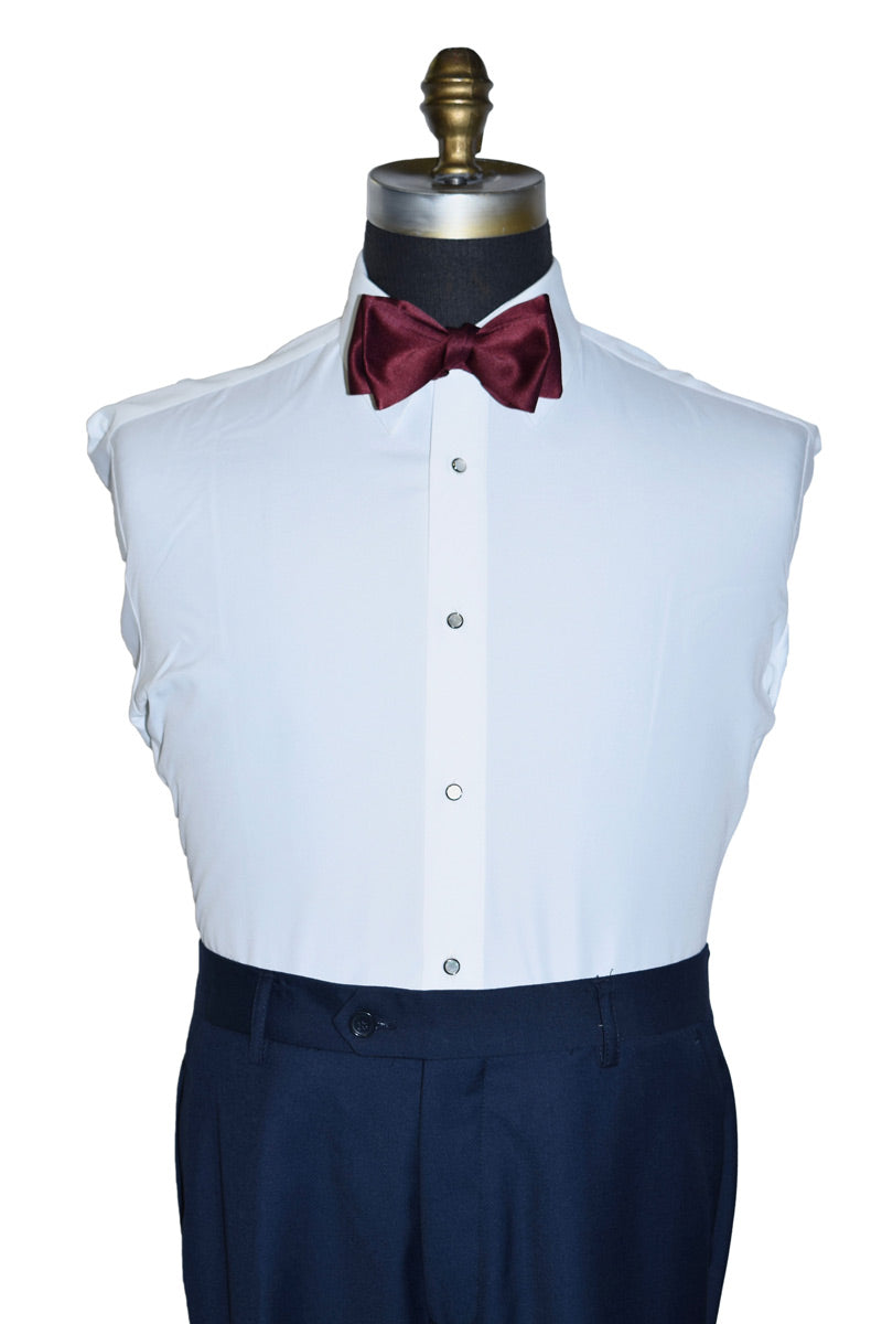 White dress shirt on a mannequin with a burgundy "tie-yourself" bow tie on a mannequin against a white background