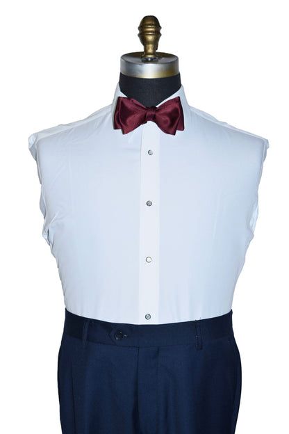White dress shirt on a mannequin with a burgundy "tie-yourself" bow tie on a mannequin against a white background