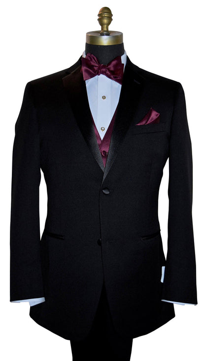 mannequin wearing a black notch-lapel tuxedo with a wine tuxedo vest and a wine "self-tie" bowtie and pocket handkercheif against a white background 