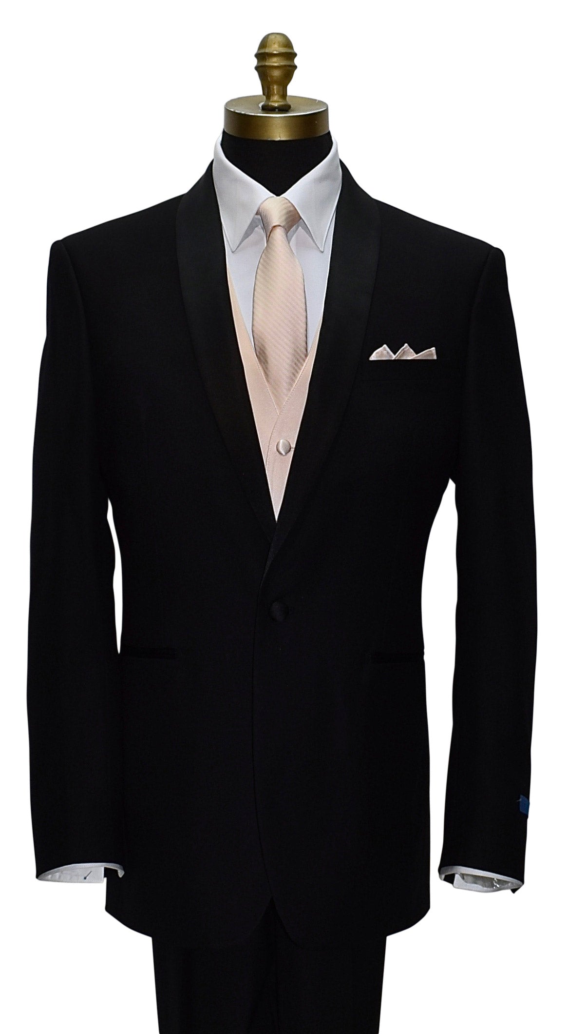 black tuxedo with a white shirt and nude striped necktie and nude satin vest on a mannequin against a white background