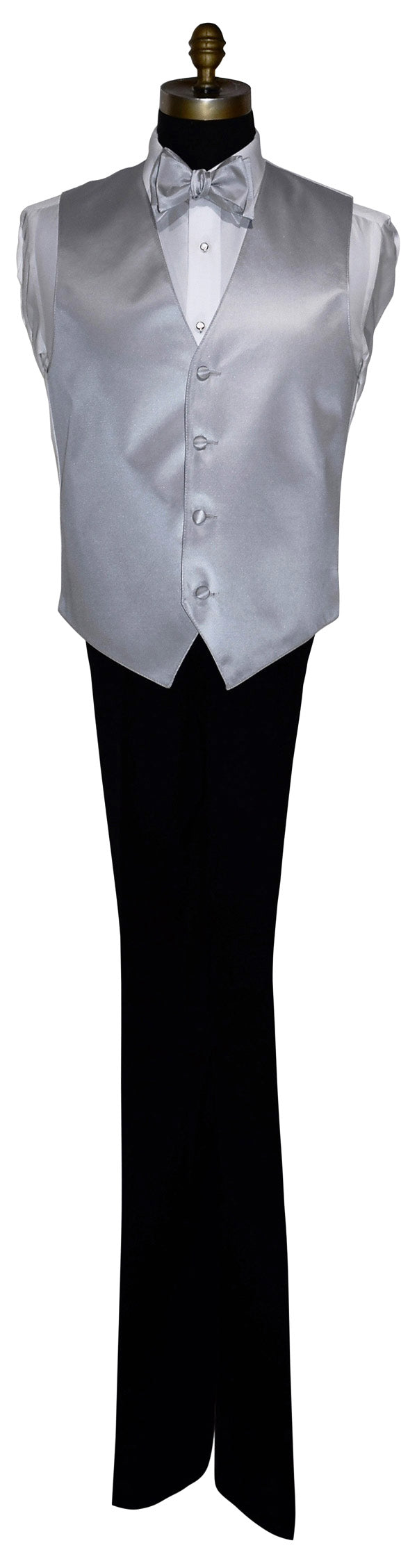 life size mannequin wearing a white tuxedo shirt with a silver tuxedo vest and silver bowtie with black tuxedo pants against a white background