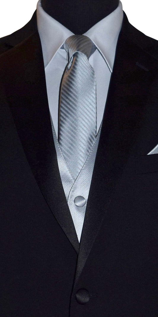 close-up Black tuxedo with a silver necktie with silver subtle stripe on a mannequin