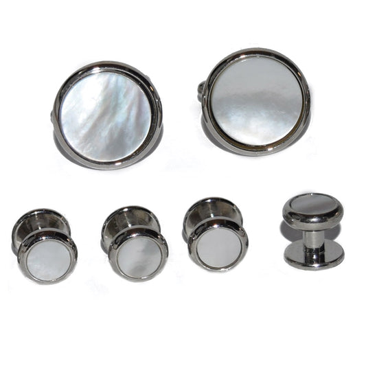 close-up mother-of-pearl studs and cufflinks in a silver setting