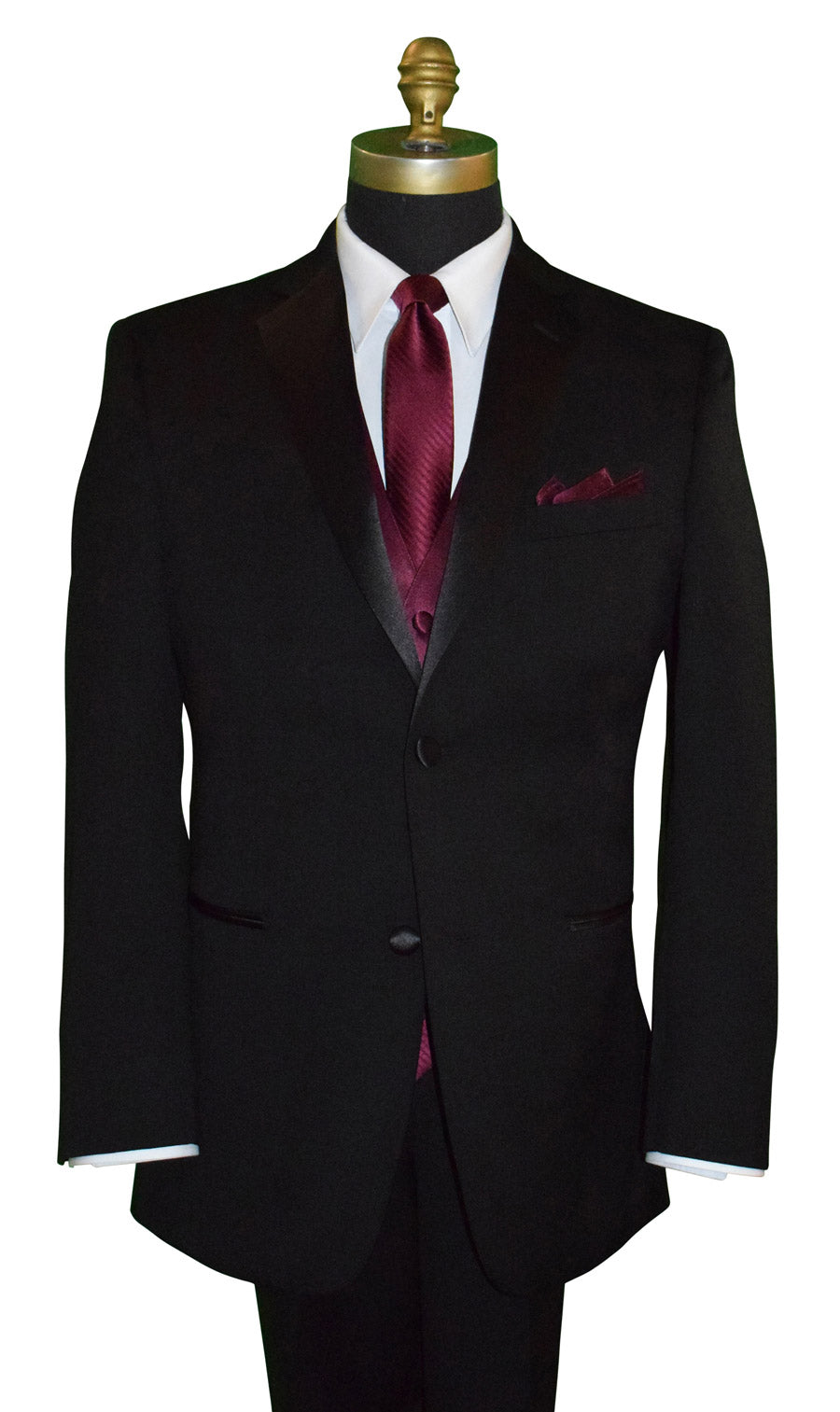 mannequin wearing a black notch-lapel tuxedo with a wine tuxedo vest and a wine subtle-stripe necktie and pocket handkerchief against a white background 
