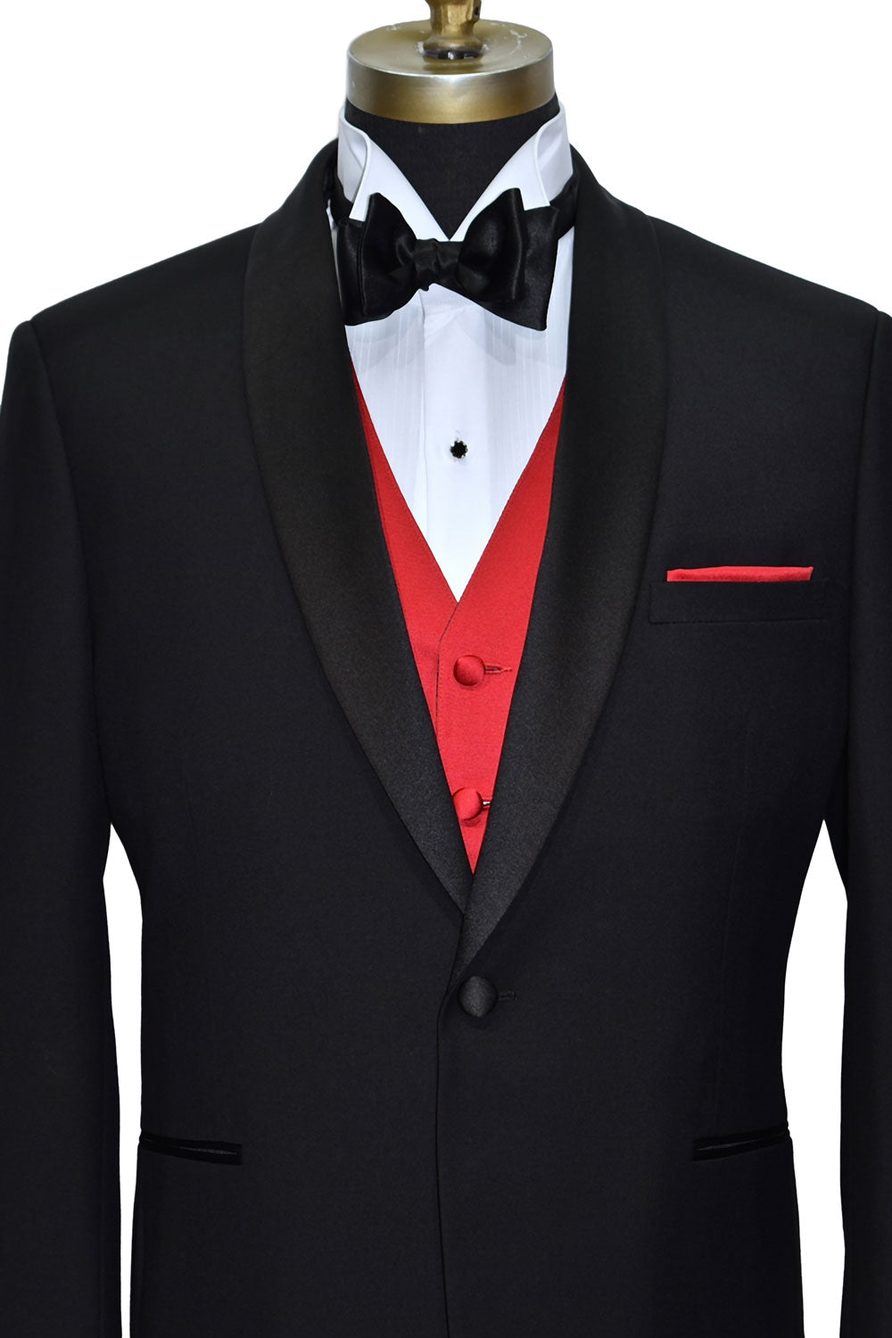 Close up photo of Black shawl collar tuxedo with black satin bow and red satin vest and red pocket handkerchief. 