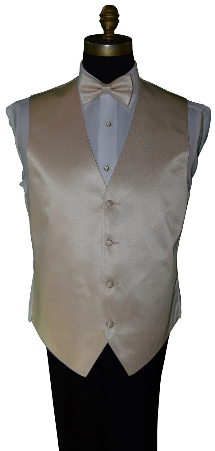 mannequin wearing a white dress shirt with a champagne "pre-tied bowtie and champagne vest  against a white background