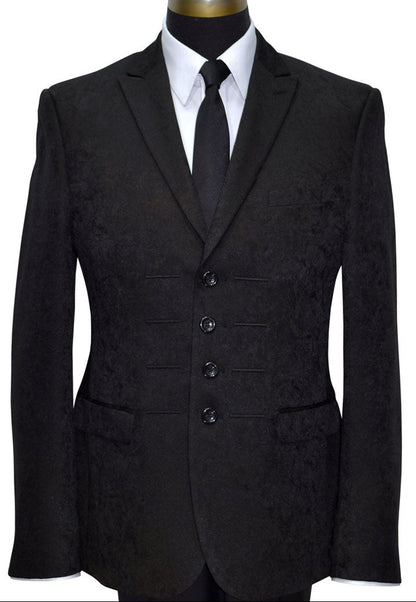 Black suit jacket on a mannequin with a white shirt and black satin stie.inny dress-tie