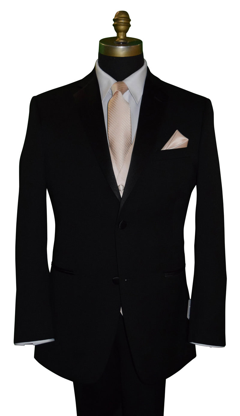 Black suit with a white shirt and nude-color tie on a mannequin against a white background