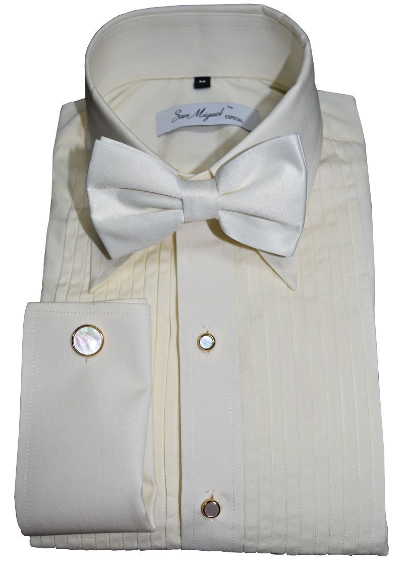 ivory tuxedo shirt wearing pearl studs and cufflinks by san miguel especial against a white background