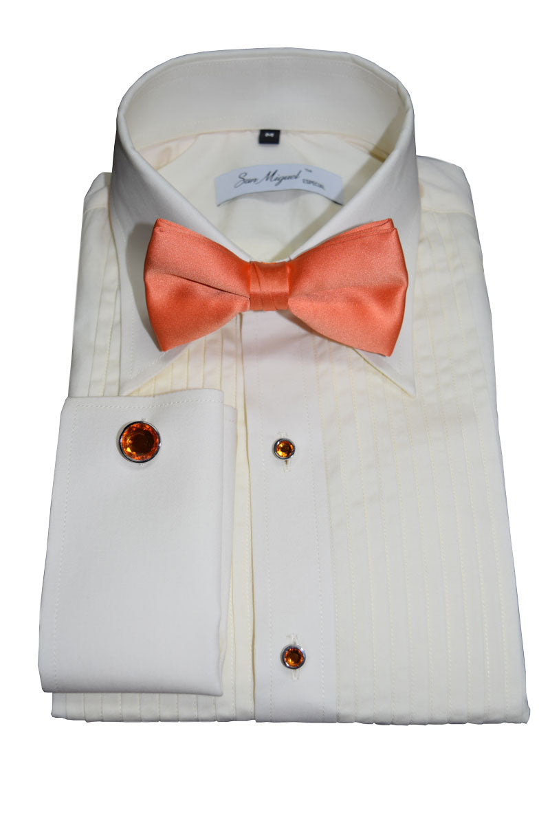Ivory tuxedo shirt with a coral bow tie and topaz orange cufflinks and studs on a white background