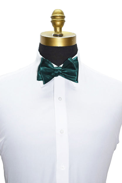 hunter Green silk "tie-yourself" bow tie on a white shirt with a gold mannequin head.