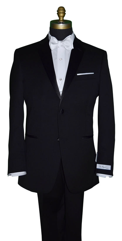 close-up black notch-lapel tuxedo on a mannequin wearing a white four-button tuxedo vest and a white bowtie against a white background