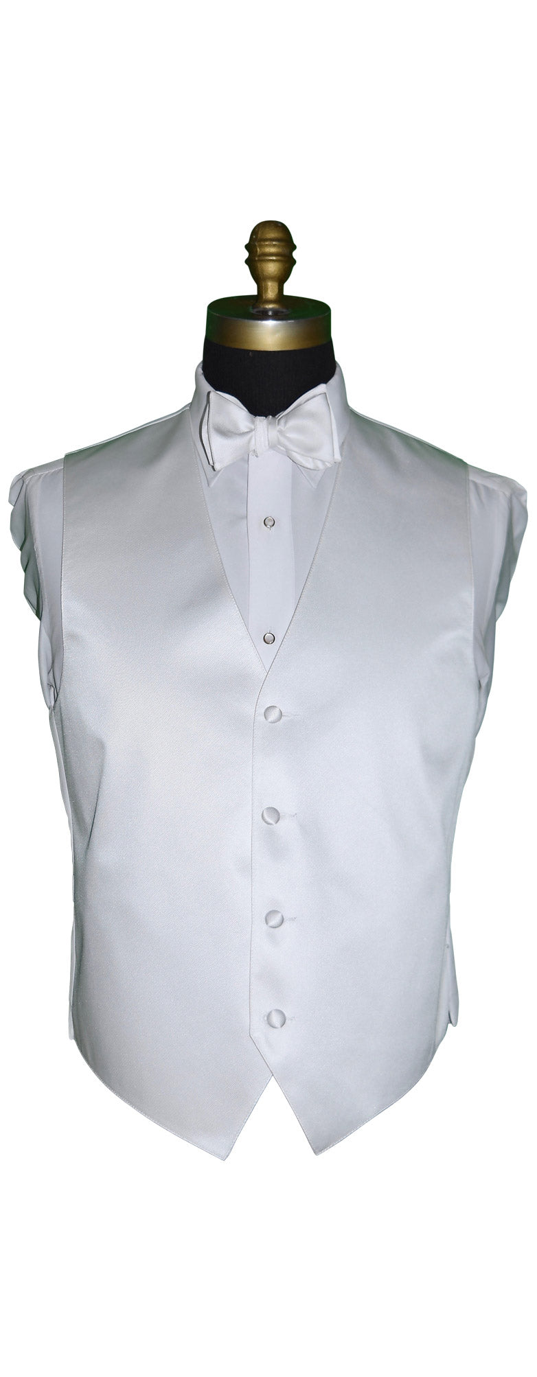 close up front view - white tuxedo vest with 4 buttons shown with a white bowtie and white shirt