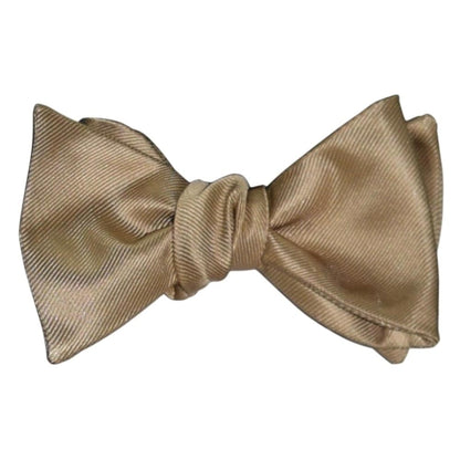 Gold "tie-yourself" bow tie on a white background