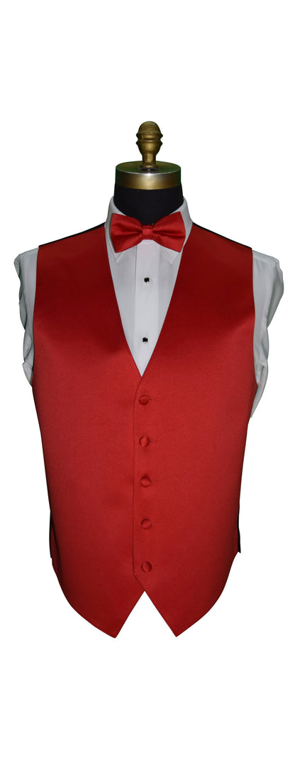 Red satin tuxedo vest with a red bow tie on a mannequin against a white background