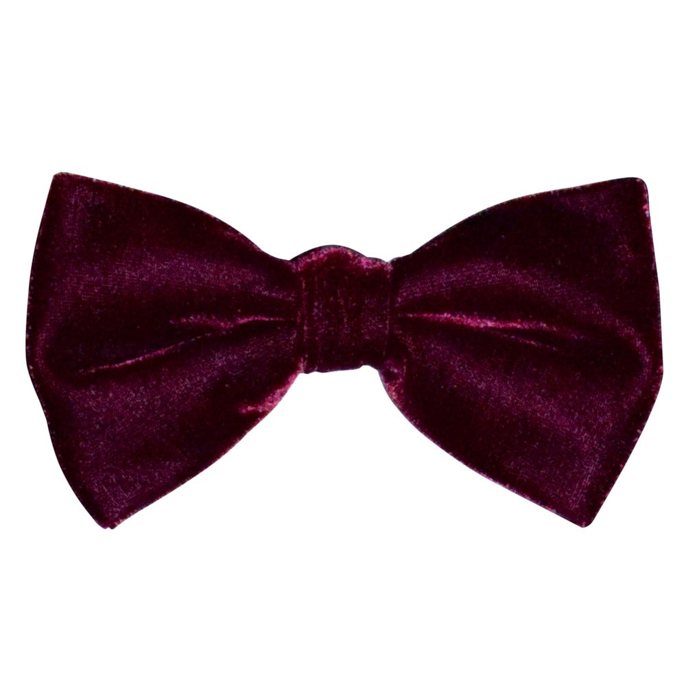 Burgundy velvet bow tie on a white background