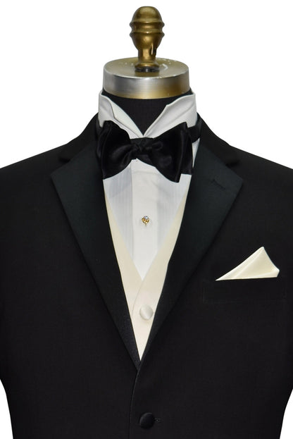 Black tuxedo with ivory satin vest and bow tie on a mannequin against a white background