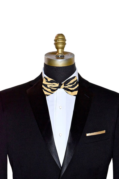 Black tuxedo with a brown and black zebra print bow tie on a mannequin against a white background