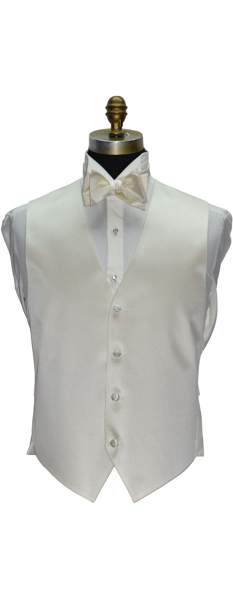 Off-white tuxedo vest and off-whie bow tie on a mannequin against a white background