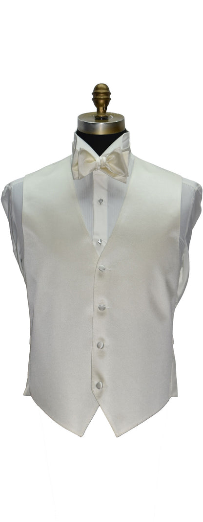 Off-white tuxedo vest and off-whie bow tie on a mannequin against a white background