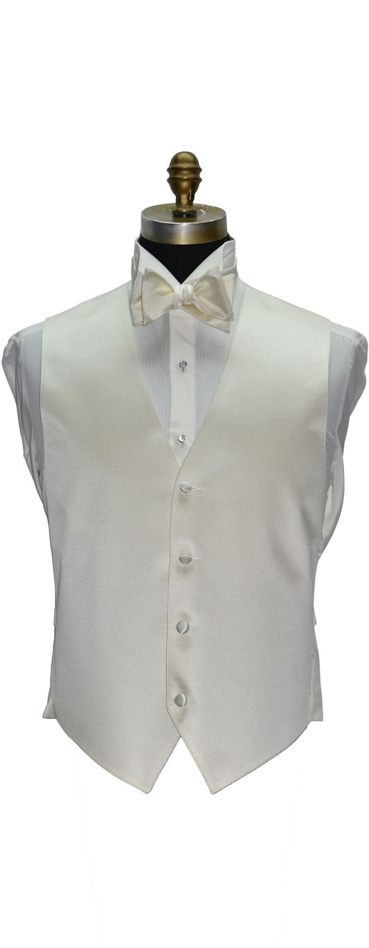 Off-white tuxedo vest and off-whie bow tie on a mannequin against a white background