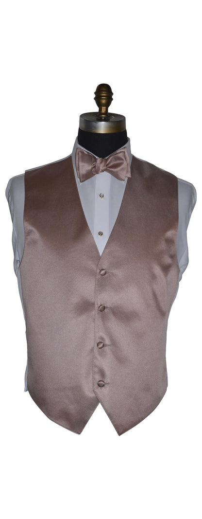 Rose-gold tuxedo vest on a mannequin with a white shirt and rose-gold "pre-tied" bow tie against a white background