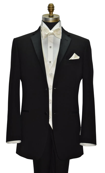 close-up mannequin wearing a black notch-lapel tuxedo with an ivory tuxedo shirt and an off-white tuxedo vest and bowtie against a white background