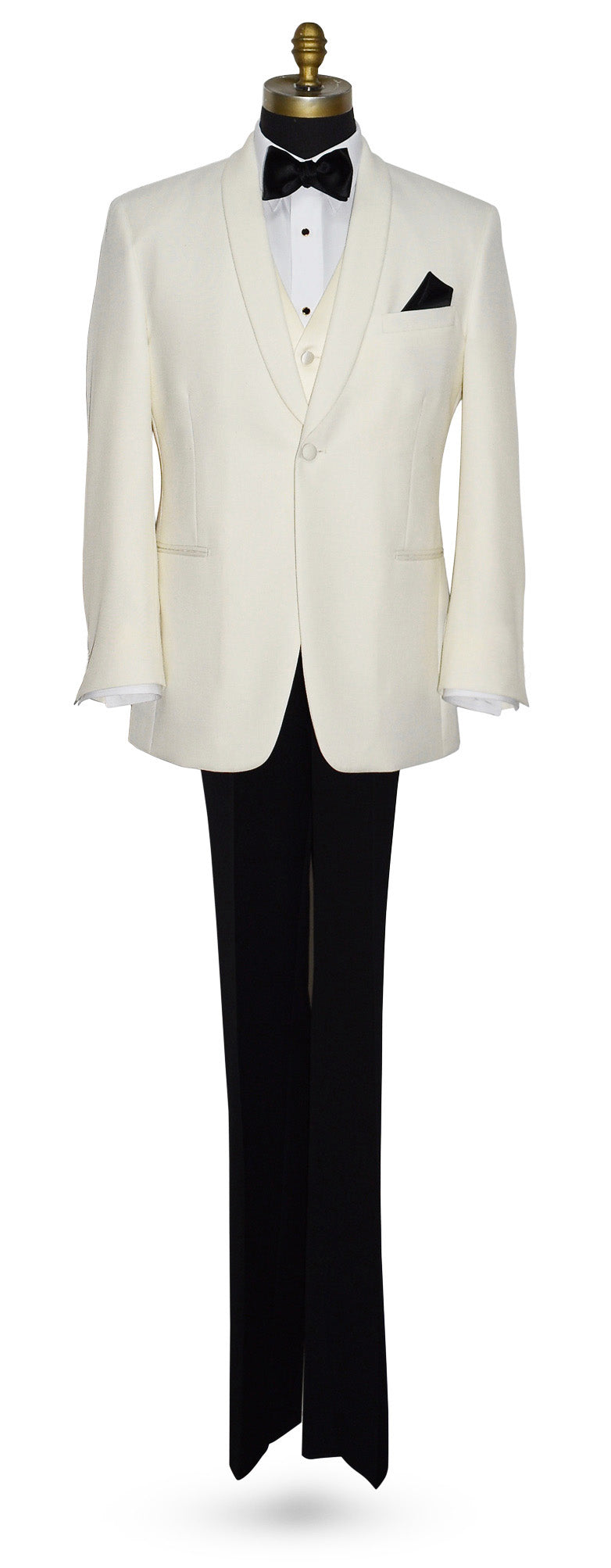 Full length view of an off-white shawl collar tuxedo jacket with black pants, and an off-white vest and black satin bowtie, against a white background