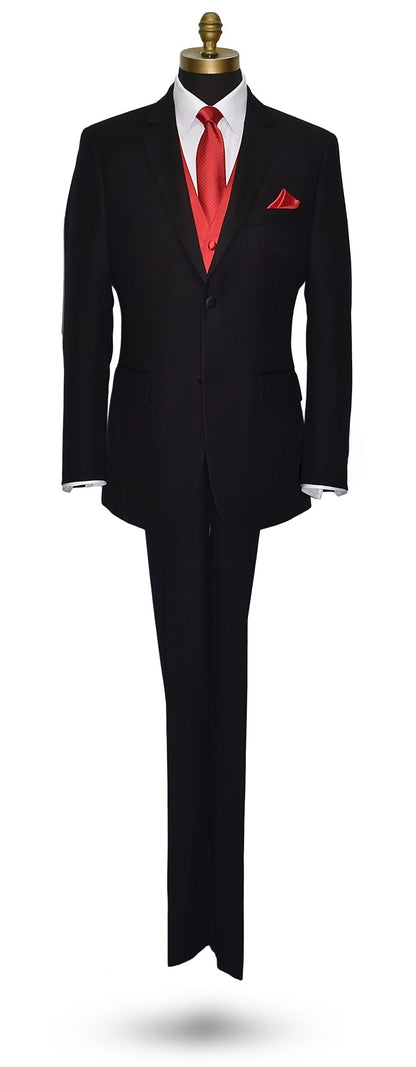 life size mannequin wearing a black tuxedo with a red vest and ruby-red necktie with subtle stripe against a white background